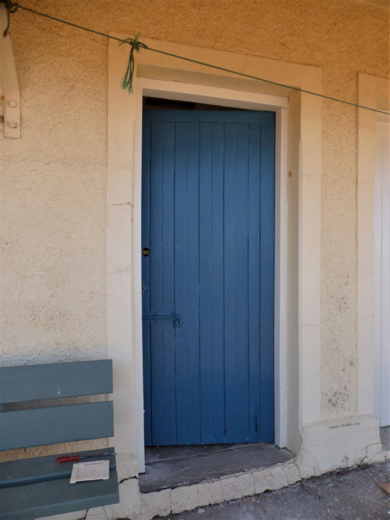 The newly repainted front door